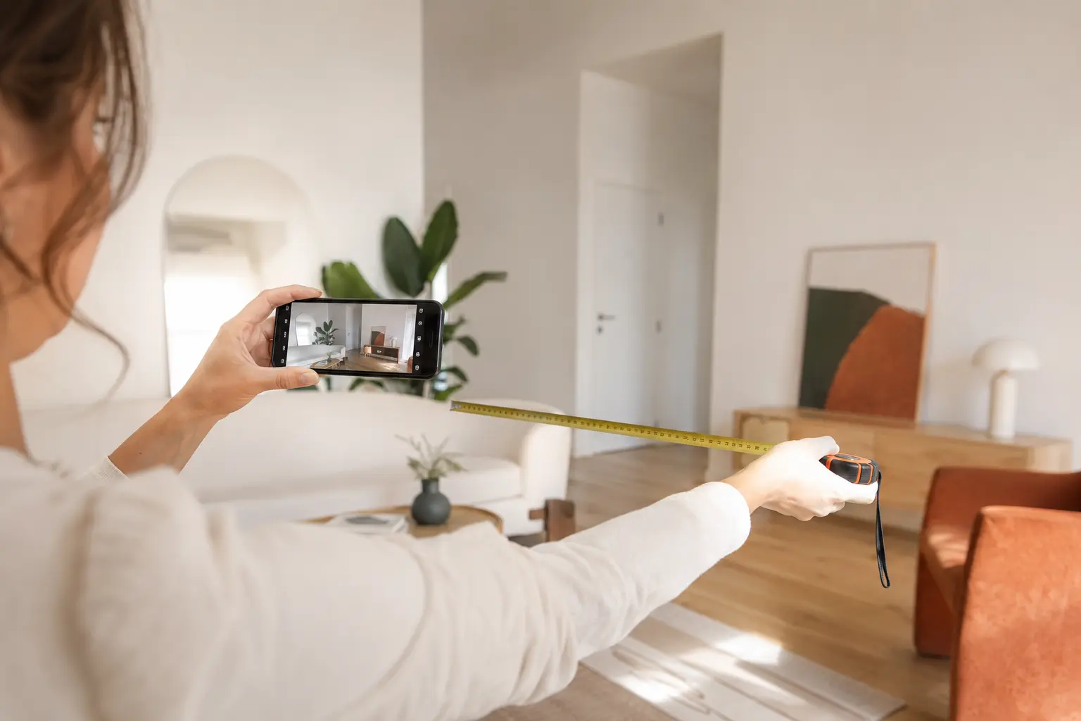 Prise de mesures et de photos d’un salon